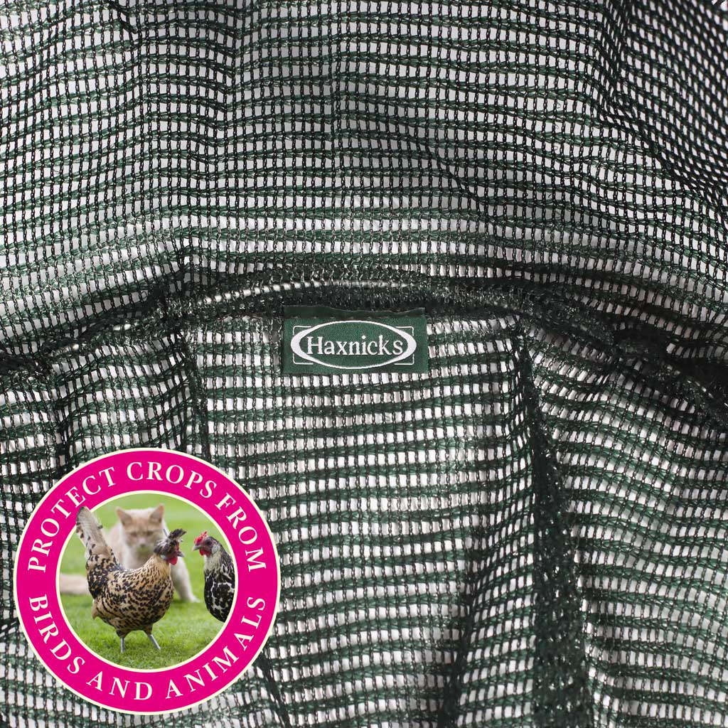Close iup of Haxnicks Haxnicks plant protection net tunnel fabric with 'protects crops from birds and animals' flash